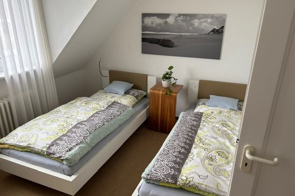  Ferienwohnung Lennermann Norderney - Schlafzimmer