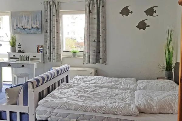 Bett  Wohnung 10 - Kleiner Leuchtturm- in der Villa Monika