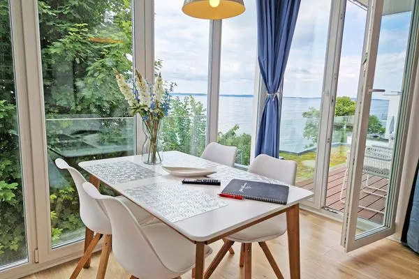Wohnzimmer  Villa Küstenperle, App. Leuchtfeuer - Meerblick pur!