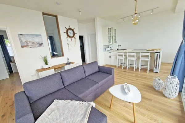 Wohnzimmer  Villa Küstenperle, App. Leuchtfeuer - Meerblick pur!