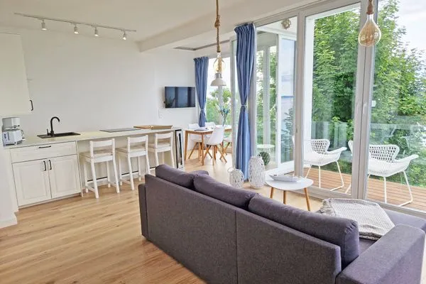 Wohnzimmer  Villa Küstenperle, App. Leuchtfeuer - Meerblick pur!