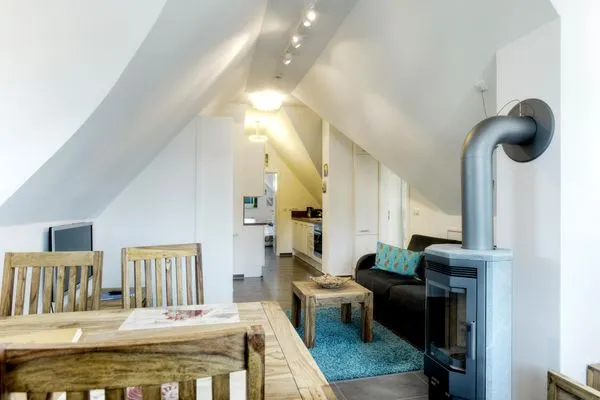 Blick von der Essecke in den Wohnbereich  de Obendtied - Wohnung 6 "Reet"