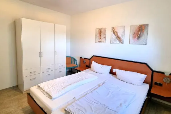 Schlafzimmer  Apartment für Drei 50