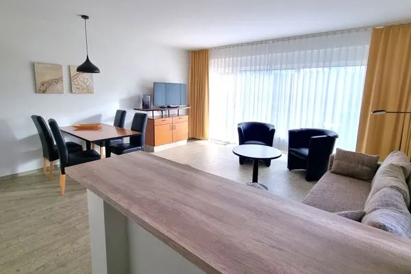 Wohnzimmer  Apartment für Drei 50