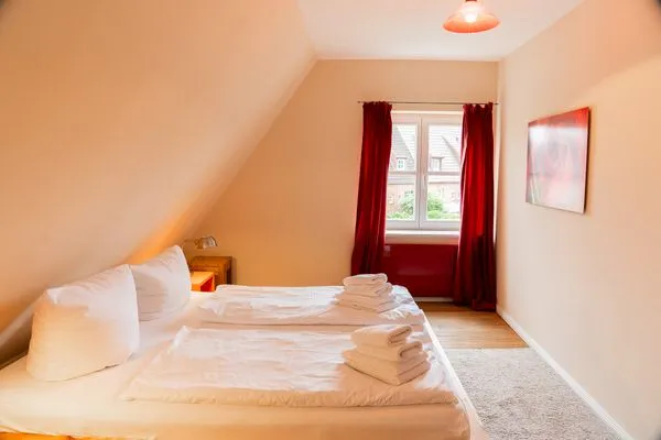 Schlafzimmer 1 OG  Kunterbunt