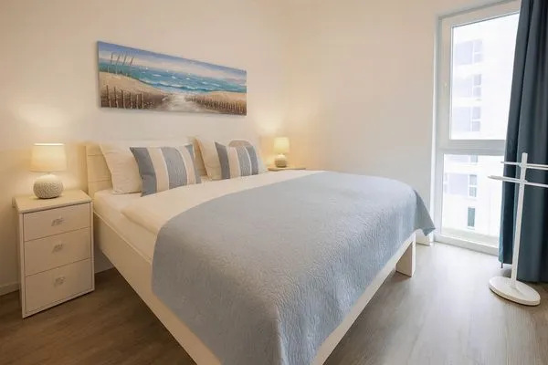 Gemütliches Schlafzimmer mit Doppelbett  Leuchtfeuer