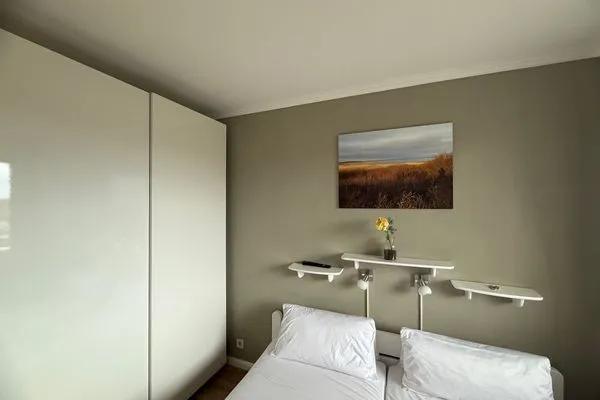 Schlafzimmer Ferienwohnung im Haus Nordland App 59