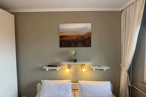 Schlafzimmer Ferienwohnung im Haus Nordland App 59