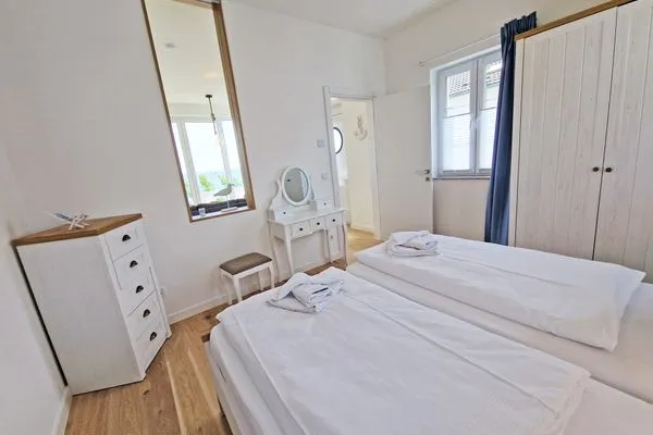 Bett  Villa Küstenperle, App. Sonnenaufgang - Meerblick pur!