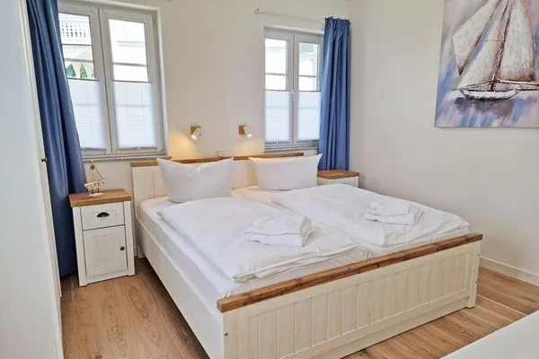 Schlafzimmer  Villa Küstenperle, App. Sonnenaufgang - Meerblick pur!