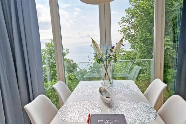 Wohnzimmer  Villa Küstenperle, App. Sonnenaufgang - Meerblick pur!