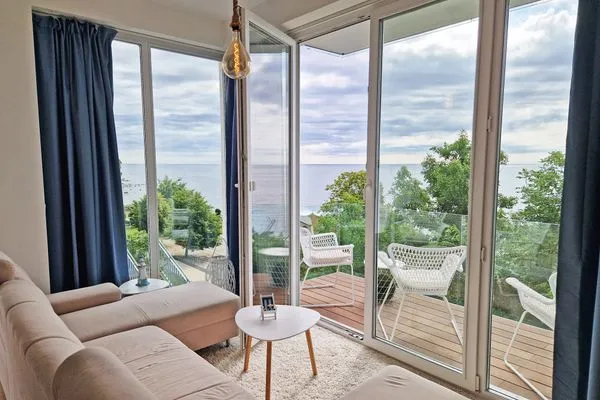 Wohnzimmer  Villa Küstenperle, App. Sonnenaufgang - Meerblick pur!