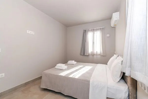 Bedroom on the ground floor  Helichrysum Lofts Family House