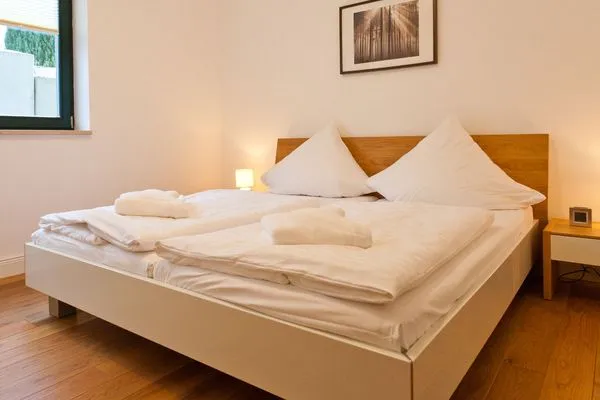 Schlafzimmer  Villa Friede-Marie, App. Hannah - mit Terrasse und Ostseeblick