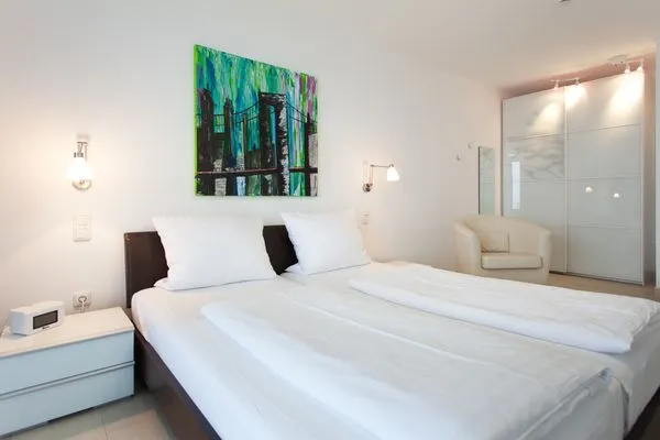 Schlafzimmer  Villa Friede-Marie, App. Ariane - mit Balkon und traumhaften Meerblick