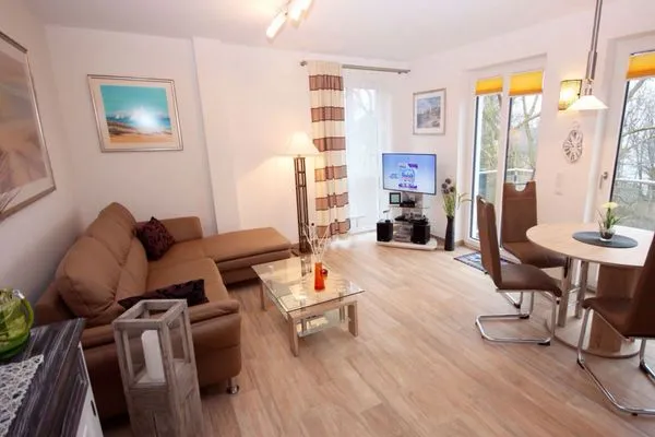 Wohnzimmer  Villa Amelie, App. Seestern - mit Balkon und Meerblick