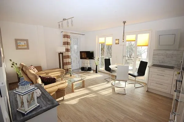 Wohnzimmer  Villa Amelie, App. Seemöwe - mit Balkon und Meerblick