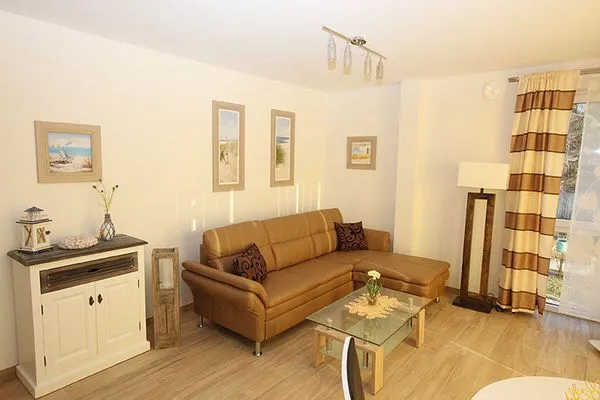 Wohnzimmer  Villa Amelie, App. Seemöwe - mit Balkon und Meerblick
