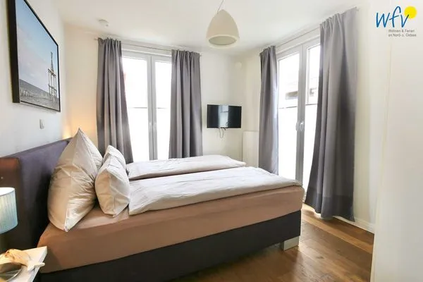 Schlafzimmer Haus Anna Ferienwohnung Strandperle