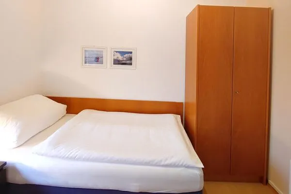 Schlafzimmer in der Ferienwohnung Inselnest am Meer in Wittdün auf Amrum Haus *Südspitze 17* Ferienwohnung *Inselnest am Meer*