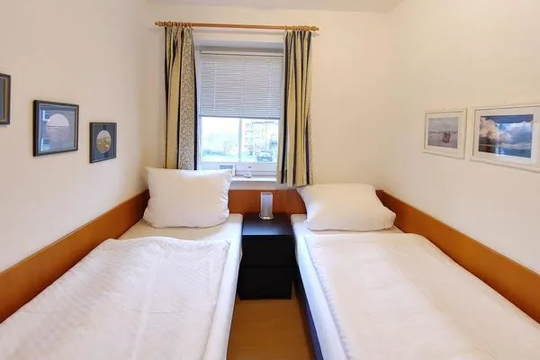 Schlafzimmer in der Ferienwohnung Inselnest am Meer in Wittdün auf Amrum Haus *Südspitze 17* Ferienwohnung *Inselnest am Meer*