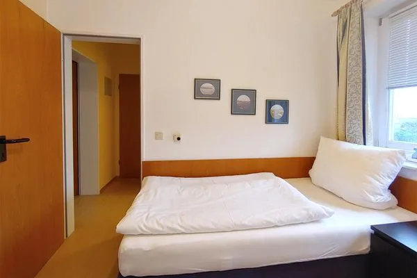 Schlafzimmer in der Ferienwohnung Inselnest am Meer in Wittdün auf Amrum Haus *Südspitze 17* Ferienwohnung *Inselnest am Meer*