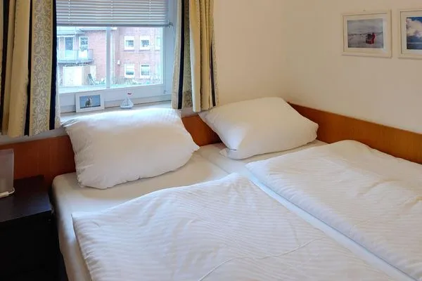 Schlafzimmer in der Ferienwohnung Inselnest am Meer in Wittdün auf Amrum Haus *Südspitze 17* Ferienwohnung *Inselnest am Meer*