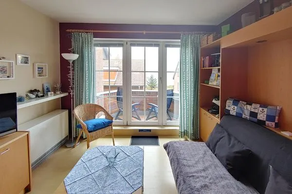 Wohnzimmer in der Ferienwohnung Inselnest am Meer des Hauses Südspitze 17 in Wittdün auf Amrum Haus *Südspitze 17* Ferienwohnung *Inselnest am Meer*