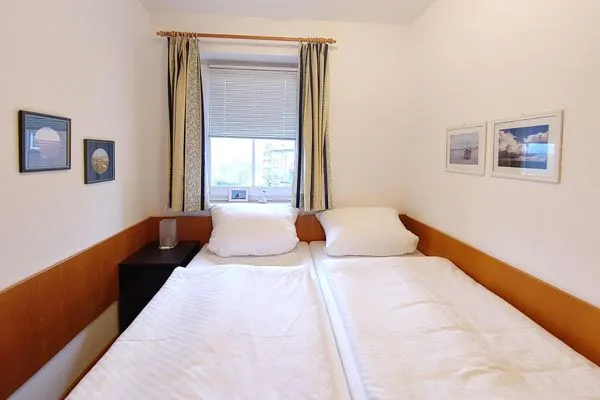 Schlafzimmer in der Ferienwohnung Inselnest am Meer in Wittdün auf Amrum Haus *Südspitze 17* Ferienwohnung *Inselnest am Meer*