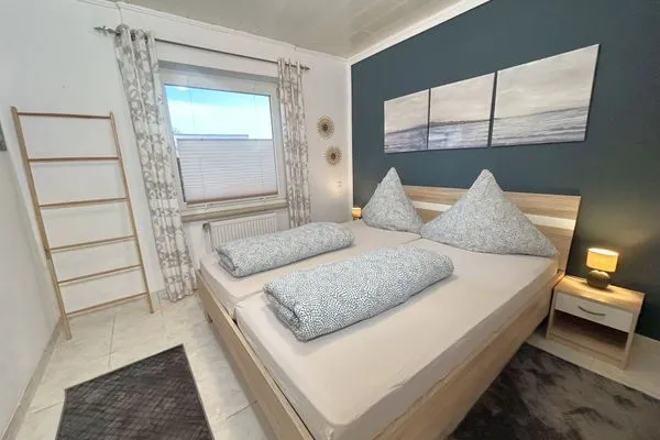 Schlafzimmer  Ferienwohnung Ostfriesenmuschel
