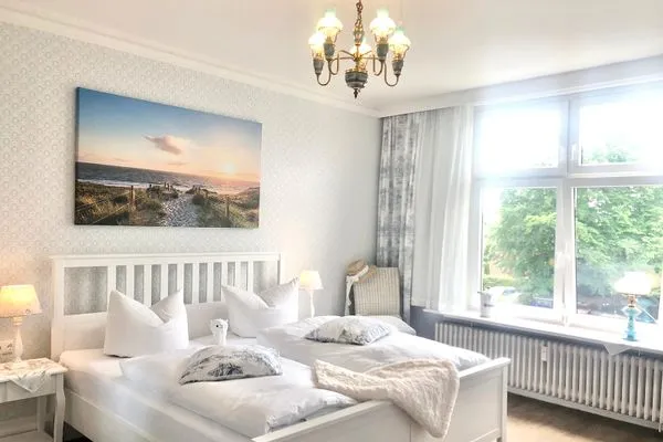 Schlafzimmer  Villa Imme App. 4 - mit überdachtem Balkon & wohnlichem Ambiente in strandnaher Lage