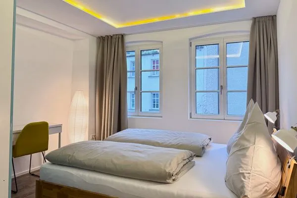 Multi-Fewo-Haus Zitronengässle 1 Ferienwohnung Metta Lindau Insel - Schlafzimmer - Doppelbett