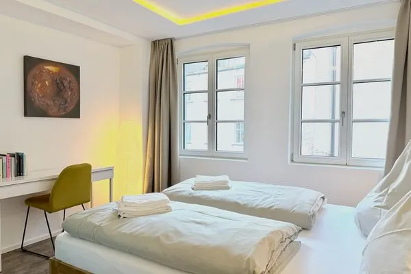 Multi-Fewo-Haus Zitronengässle 1 Ferienwohnung Metta Lindau Insel - Schlafzimmer - Doppelbett