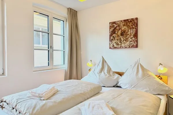 Multi-Fewo-Haus Zitronengässle 1 Ferienwohnung Metta Lindau Insel - Schlafzimmer - Doppelbett