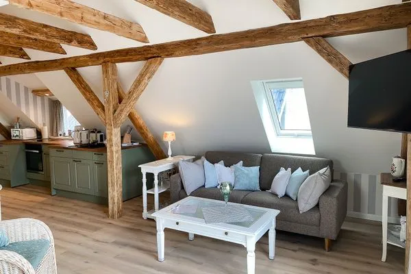 Wohnzimmer  Villa Imme App. 5 - großzügige Studio-Ferienwohnung mit Südbalkon & Meerluft-Feeling