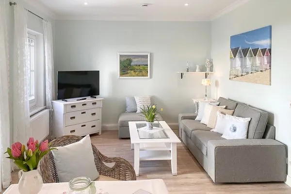 Wohnzimmer  Haus Anholt App. 36 - Auszeit zu Zweit mit Strandkorb auf dem Balkon
