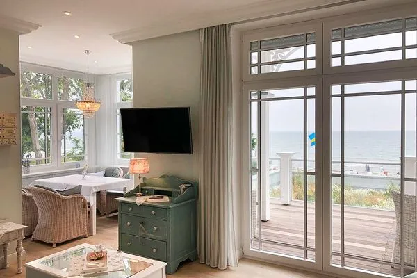 Wohnzimmer  Villa Svanen App. 1 - exklusive Ferienwohnung mit Panorama-Meerblick - Deine Ferien am Meer