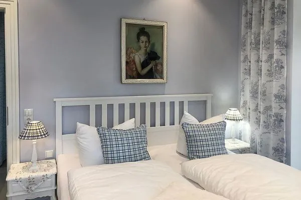 Schlafzimmer  Villa Svanen App. 1 - exklusive Ferienwohnung mit Panorama-Meerblick - Deine Ferien am Meer