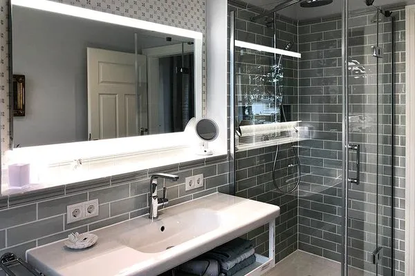 Badezimmer  Villa Svanen App. 1 - exklusive Ferienwohnung mit Panorama-Meerblick - Deine Ferien am Meer