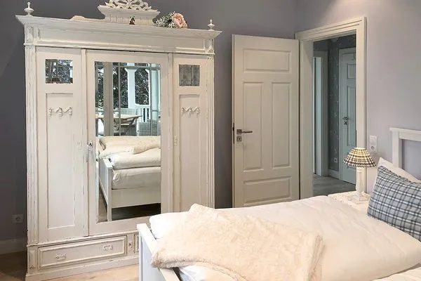 Schlafzimmer  Villa Svanen App. 1 - exklusive Ferienwohnung mit Panorama-Meerblick - Deine Ferien am Meer