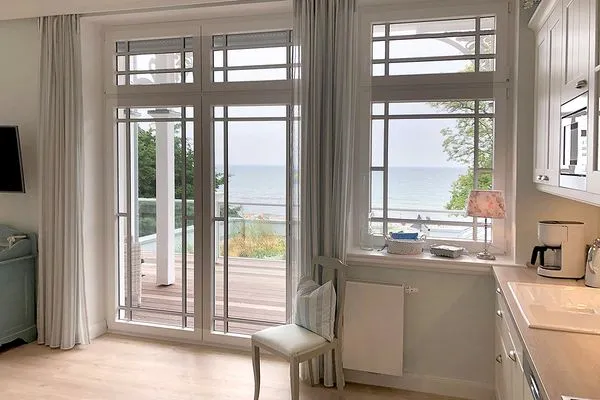 Wohnzimmer  Villa Svanen App. 1 - exklusive Ferienwohnung mit Panorama-Meerblick - Deine Ferien am Meer