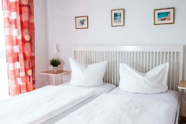 Schlafzimmer  Haus Victoria, App. Sonnendeck - mit Meerblick