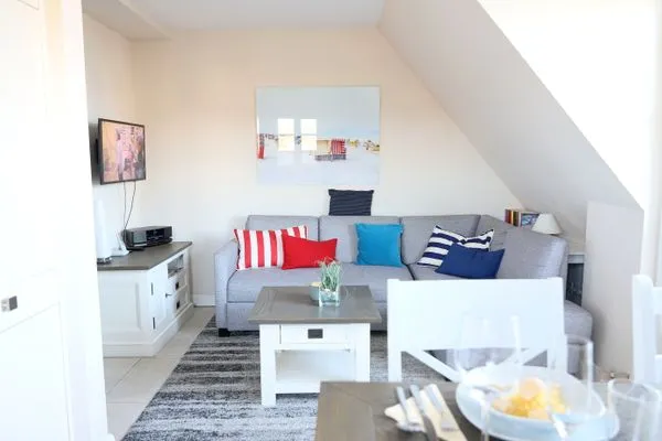 Wohnzimmer  Norderstr. 55c, Whg. 11, DG, Sundowner