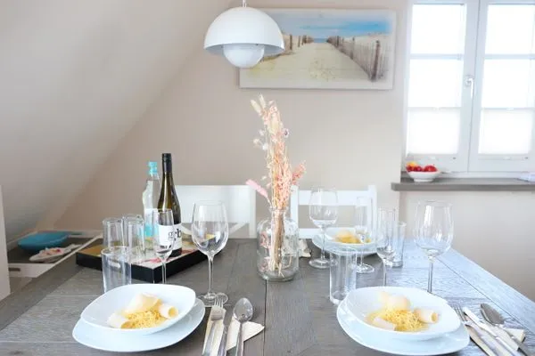 Wohnzimmer  Norderstr. 55c, Whg. 11, DG, Sundowner