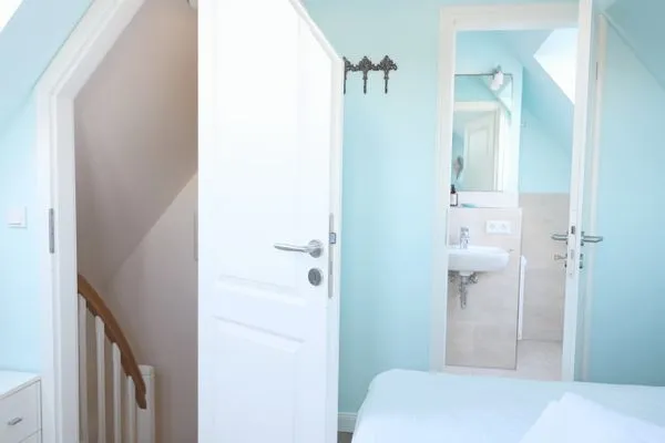 Schlafzimmer  Norderstr. 55c, Whg. 11, DG, Sundowner