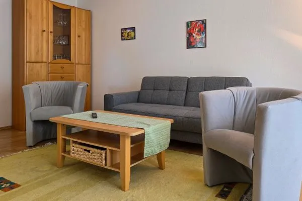 Wohnzimmer  Ferienwohnung Feuerstein - in Hafennähe