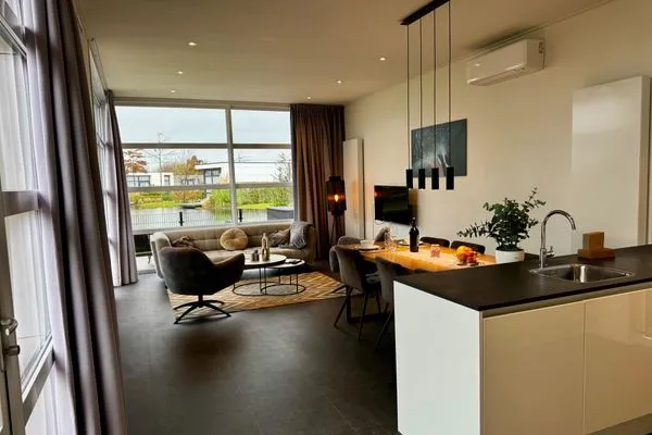  Marina Strandbad Chalet Waterlijn mit Zaun Haus Nr. 91