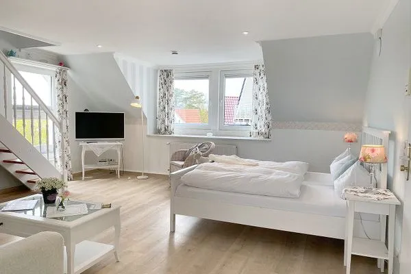 Wohnzimmer  Haus Midsommer App. 14 - zentral & strandnah mit 2 Schlafzimmern auf zwei Etagen