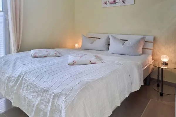 Schlafzimmer  Ferienhaus Zum Kreideblick, FeWo Muschel