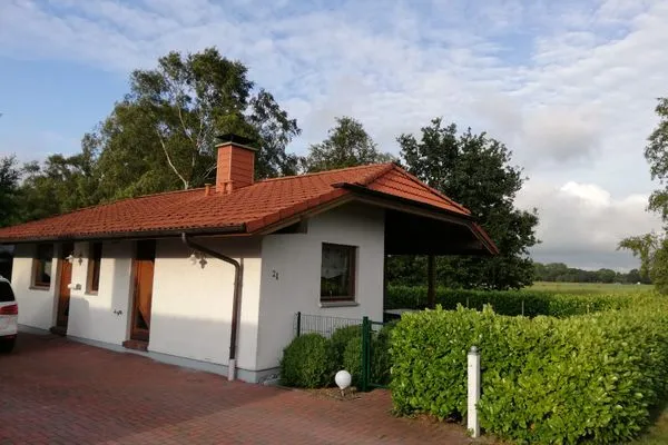 Entdecken Sie Ihr Traumferienhaus mit rotem Dach in ruhiger Lage!  Haus Vier-Pfoten